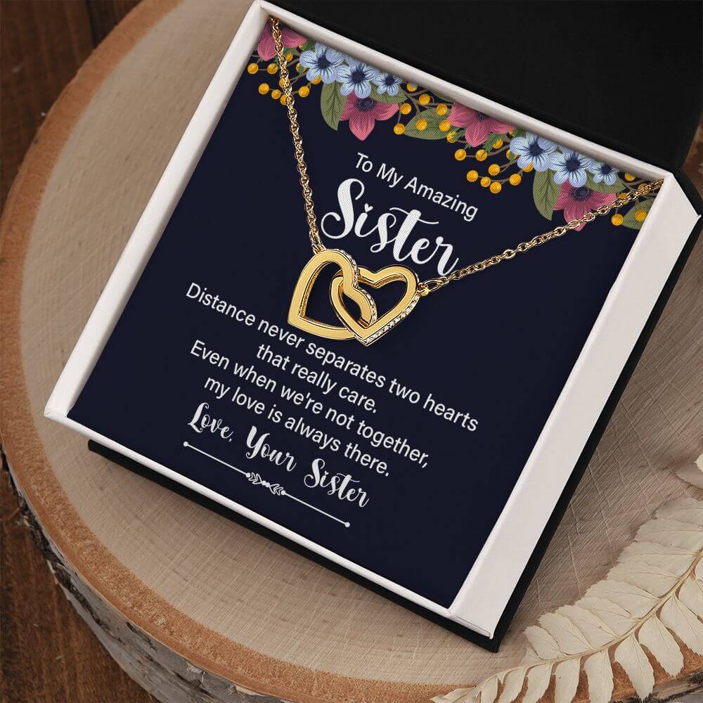 Amazing Sister rose gold and silver interlocking hearts necklace in open mahogany luxury LED gift box with message card"