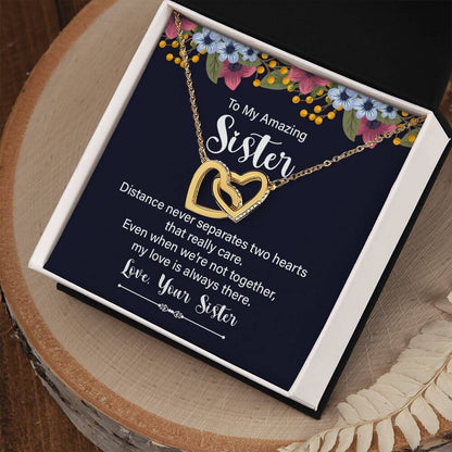 Amazing Sister rose gold and silver interlocking hearts necklace in open mahogany luxury LED gift box with message card"
