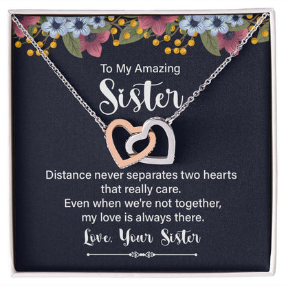 Amazing Sister interlocking hearts necklace in yellow gold finish on To My Amazing Sister sentimental message card